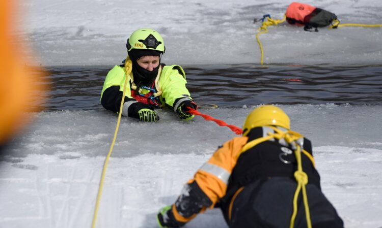 Kyra Costar, of Hermitage, a park and recreation management student at Butler County Community College, grasps a tether Feb. 17 on BC3’s main campus in Butler Township as part of ice rescue and emergency response technician certification offered through BC3’s program and from the Pennsylvania Fish and Boat Commission.