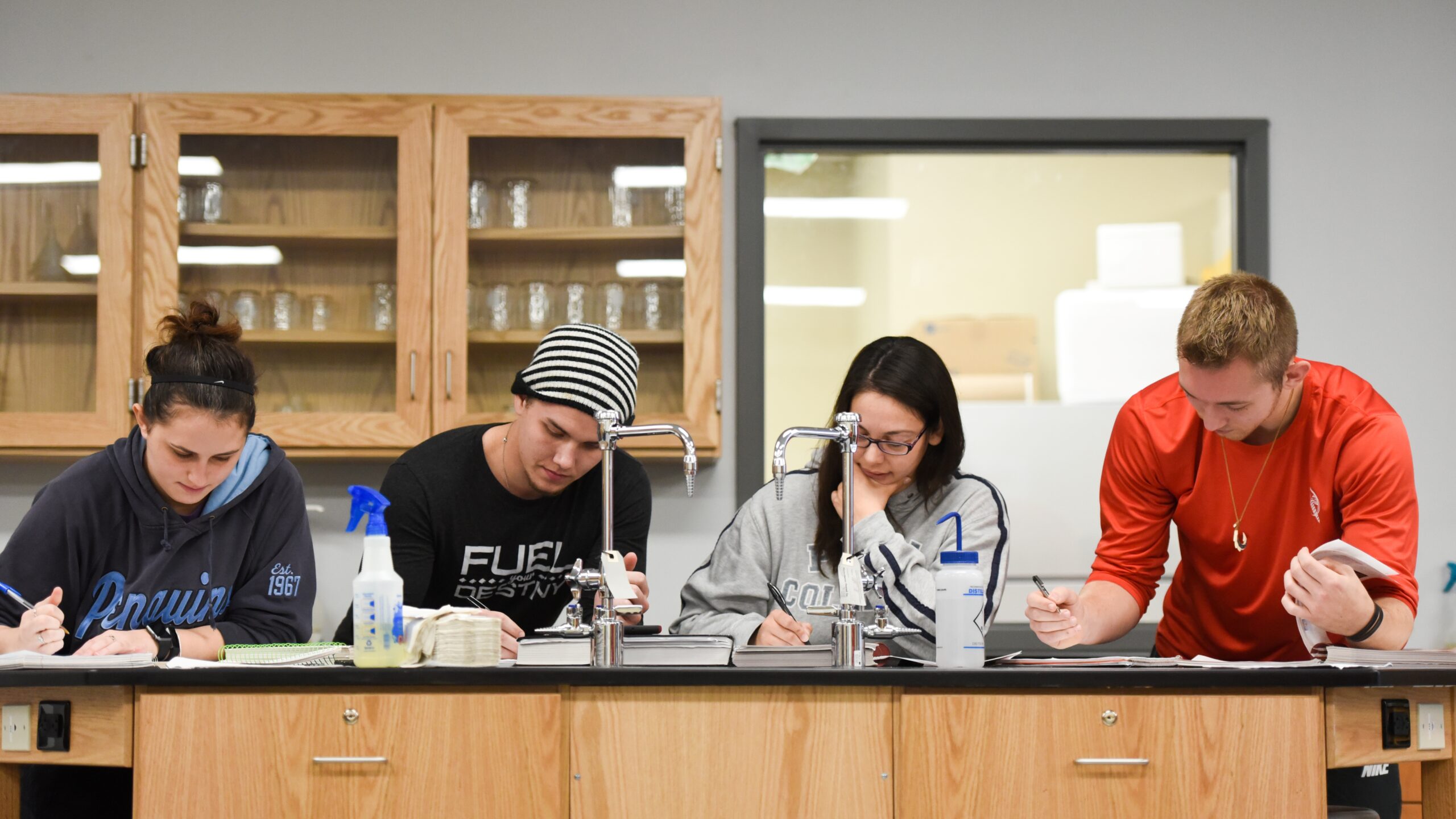 Students studying in a science lab.