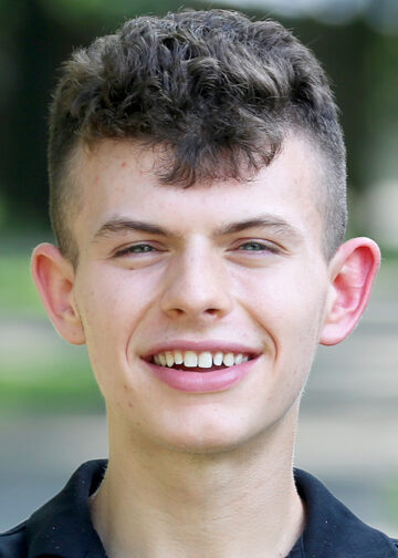 young man smiling headshot, ian moore